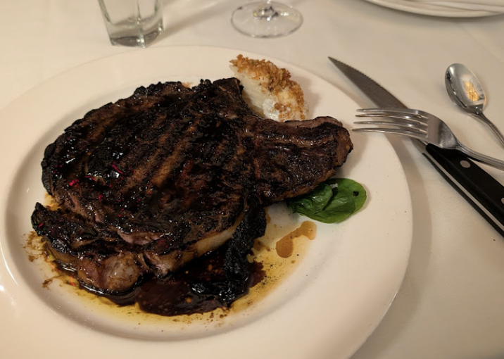 The Capital Grille signature dishes Dry Aged Ny Strip Steak Frites with Aji Verde
Seared Tenderloin with Butter Poached Lobster Tails
Lobster and Crab Cakes